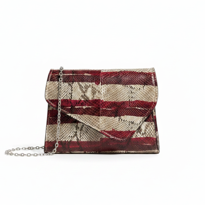 Borsa clutch con catena appoggiata